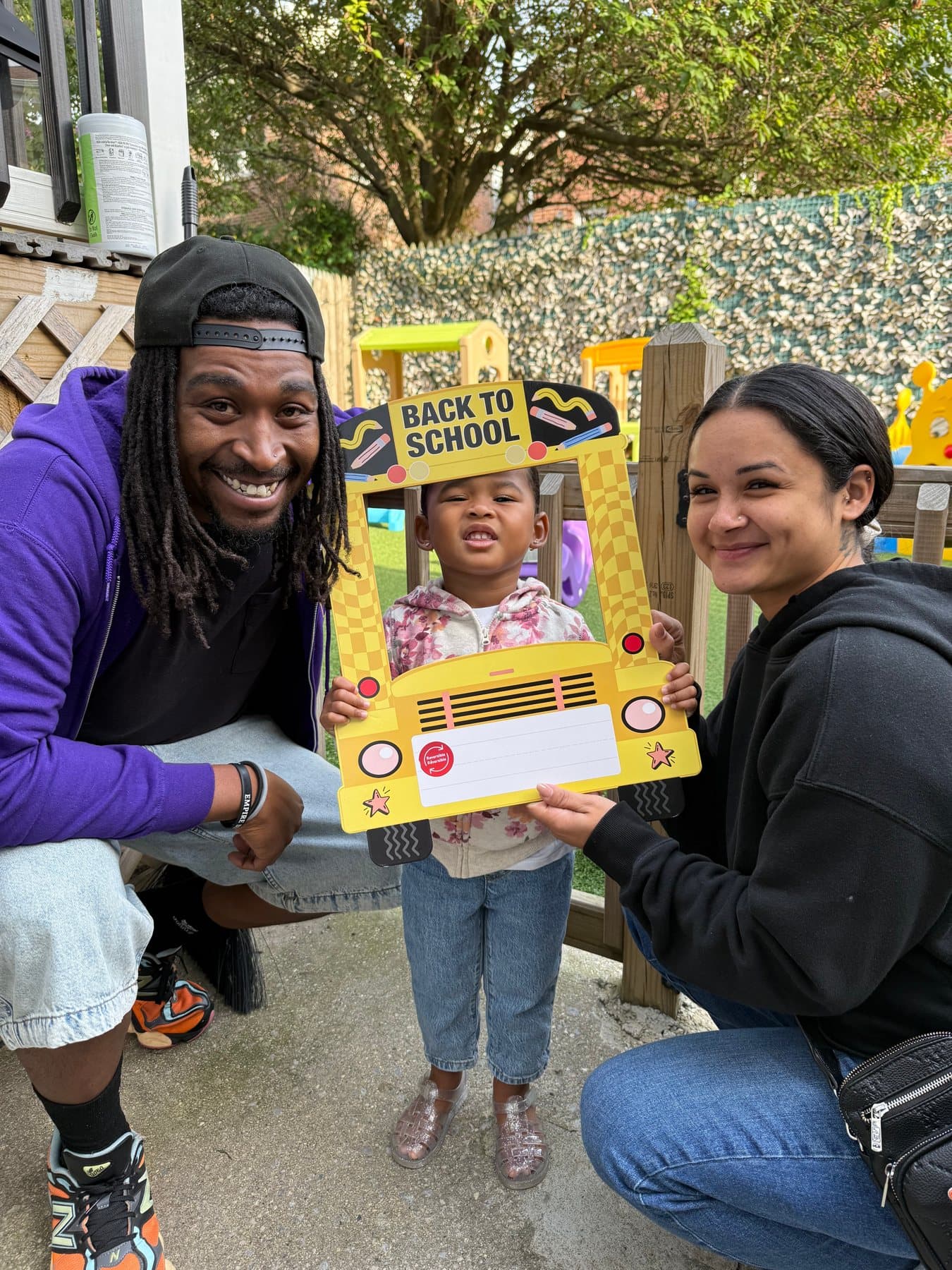 A family celebrating back-to-school moments at Rising Scholars
